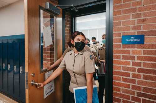 RNA-cadet-walking-through-classroom-door