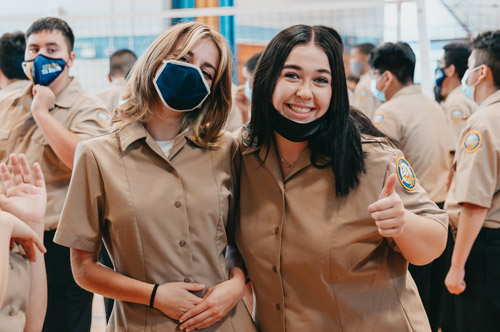 RNA two cadets smiling in gym RNA two cadets smiling in gym